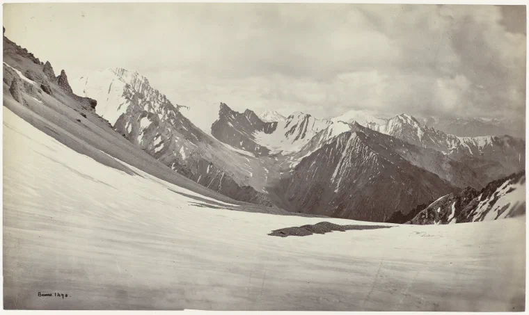 Photograph from 1866 looking east across successive snow-covered Himalayan summits from a high pass